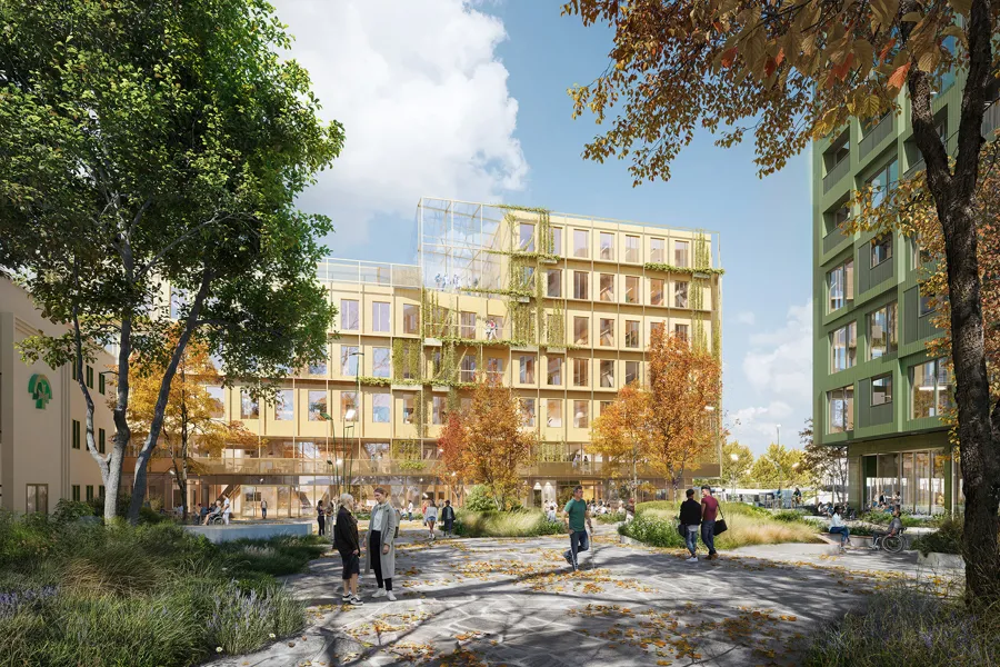 En gruppe mennesker som går foran en bygning