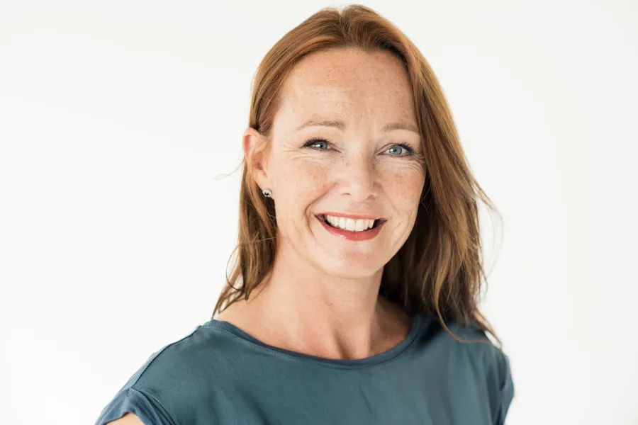 En person som smiler for kameraet